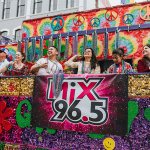 Mix 96.5 Float with Riders Throwing Beads