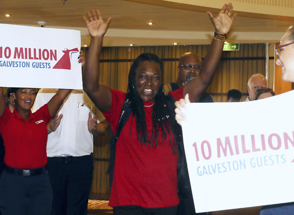 Marsha Taulton boards Carnival Breeze as the 10 millionth Carnival guest embarking from Galveston